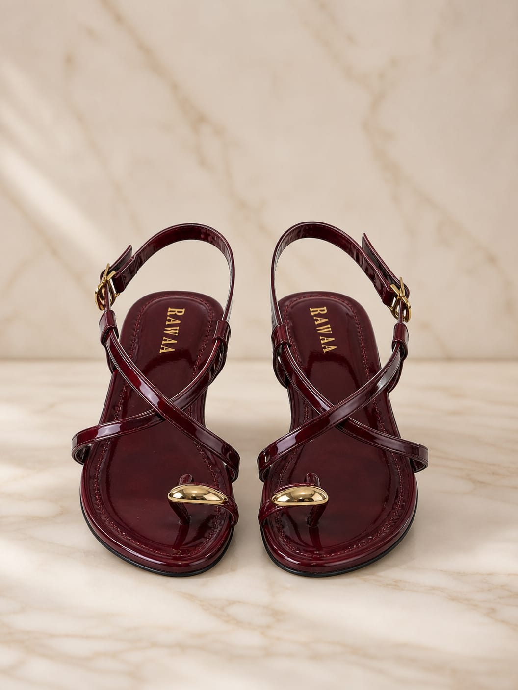 Maroon pattet strappy sandal.