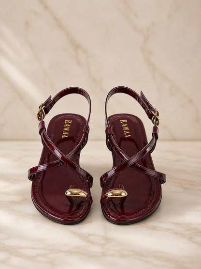 Maroon pattet strappy sandal.